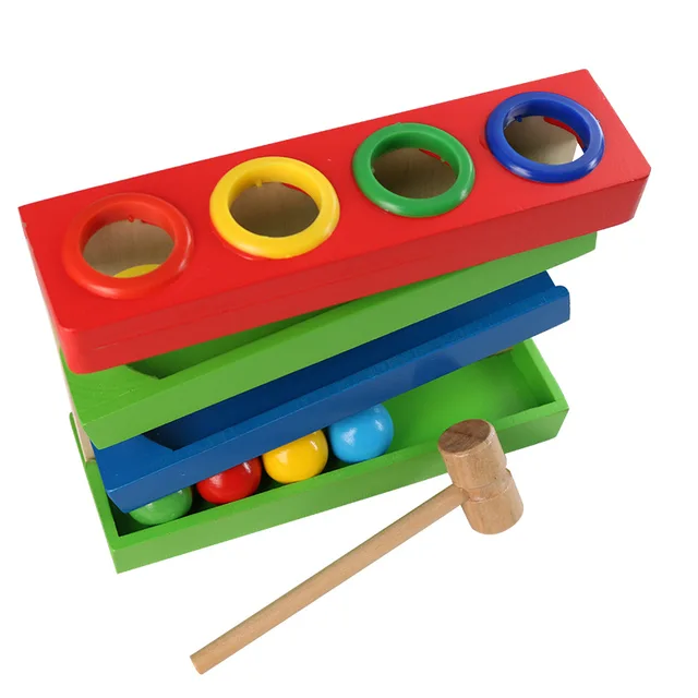 Four play hammer ball game